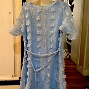 It’s M women’s beautiful light blue Dress with a soft unique detailing all over